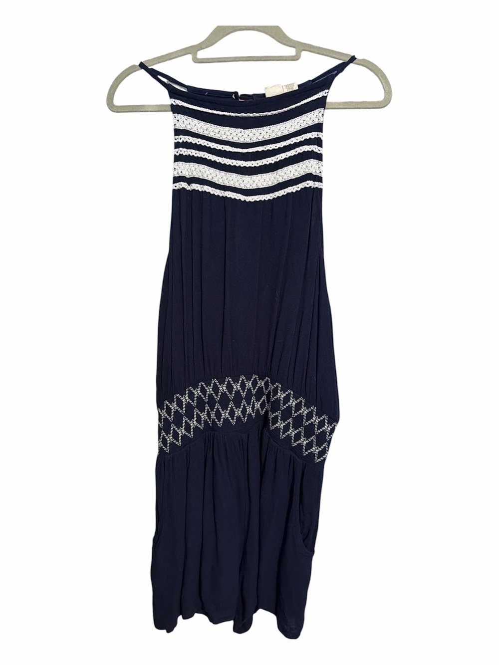 BEACH BY EXIST Navy Romper with white embroidery. smocked waist side pockets